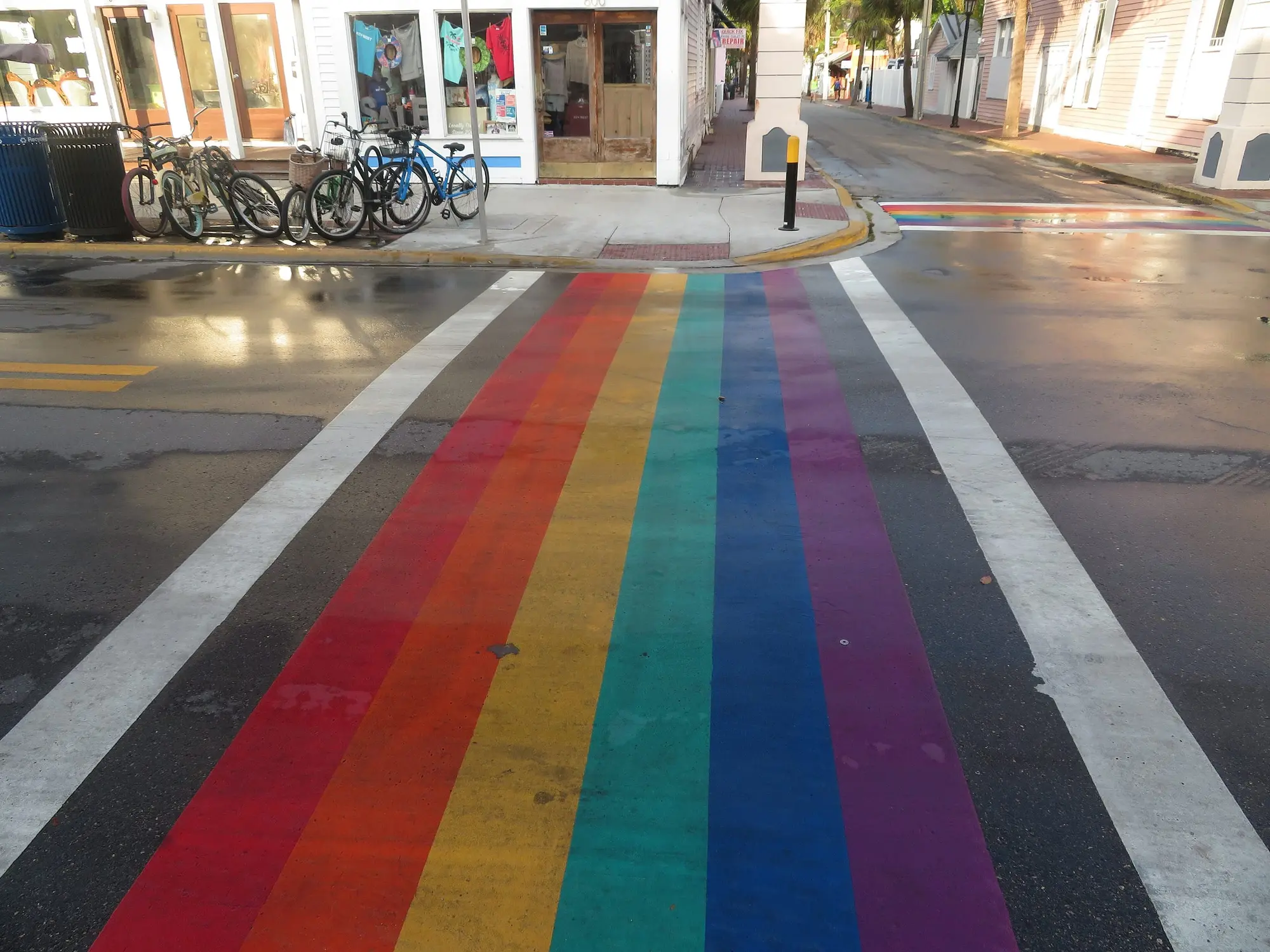The rainbow crosswalk on Duval Street in Key West, with bicycles parked beside it
