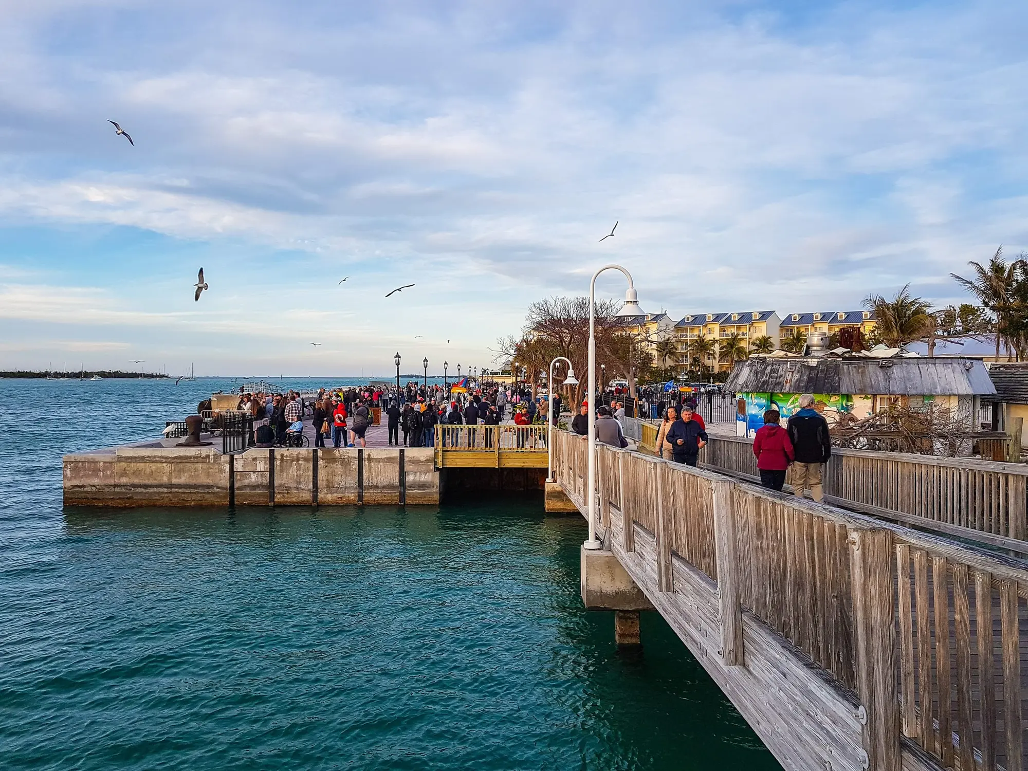 Crowds gathering along the Mallory Square waterfront for the sunset celebration
